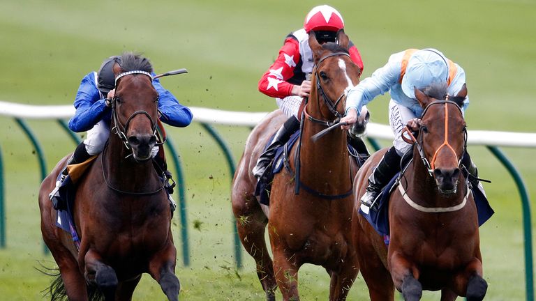 NEWMARKET, ENGLAND - APRIL 12: Ryan Moore riding Ventura Storm (R) win The 1stsecuritysolutions.co.uk Feilden Stakes at Newmarket racecourse on April 12, 2