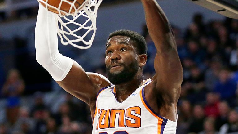 Deandre Ayton dunks the ball on his way to a career-high 35 points against the Minnesota Timberwolves