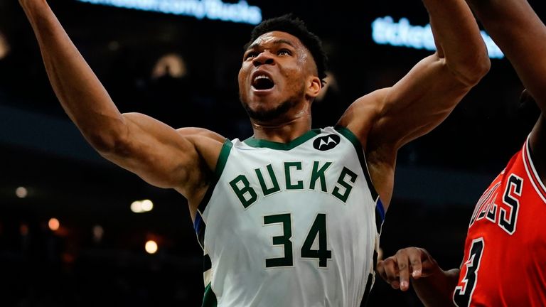 Milwaukee Bucks superstar Giannis Antetokounmpo is fouled by Chicago Bulls big man Tristan Thompson during the first half of an NBA clash in March 2022