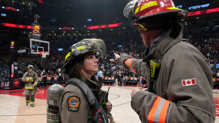 The clash between the Toronto Raptors and the Indiana Pacers is suspended as firefighters work to evacuate the building